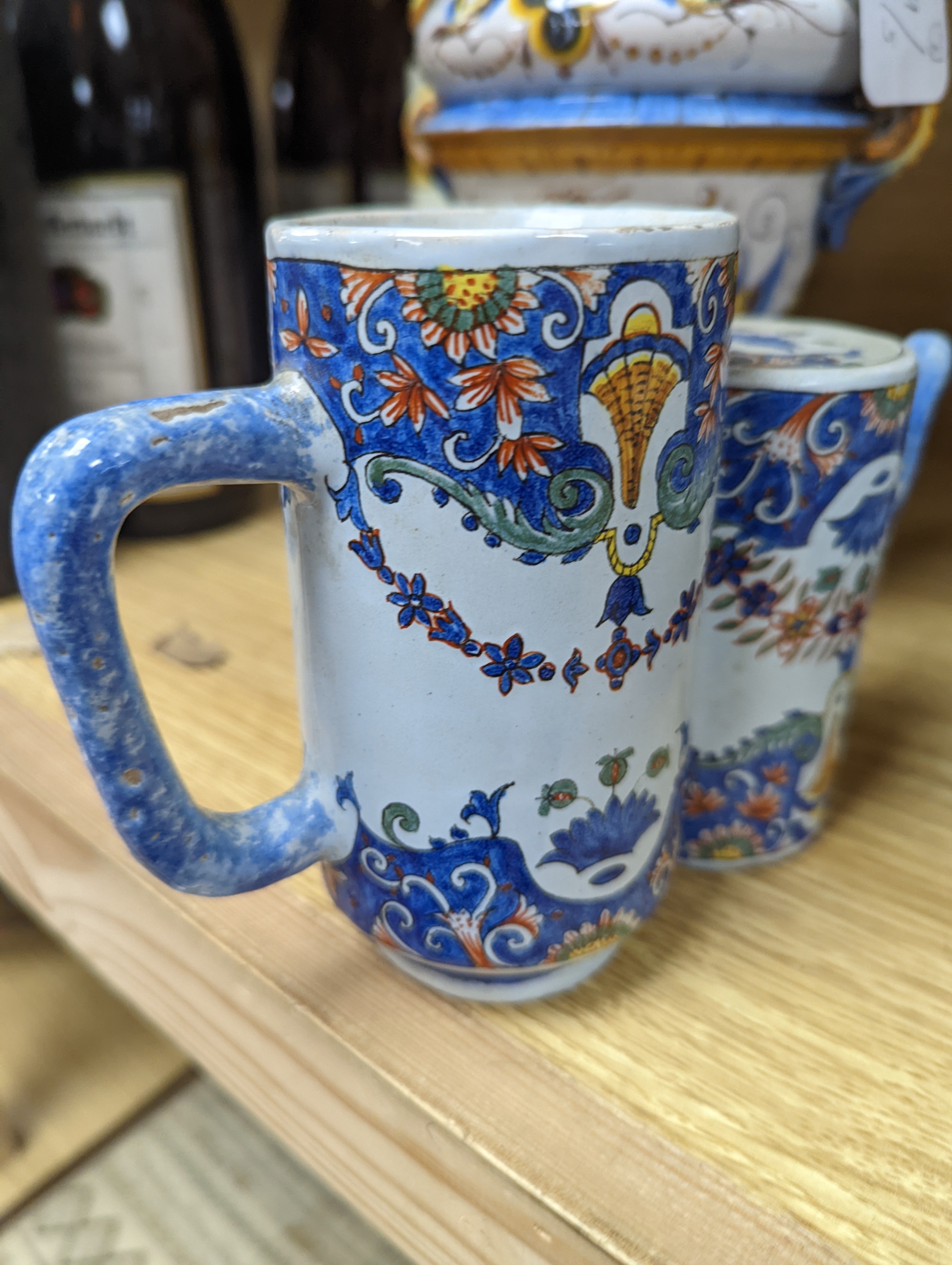 A Ginori maiolica two handled vase and Delft polychrome double cylinder teapot 27cm